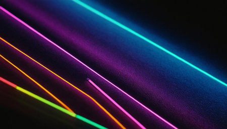 Neon lines on black background. Abstract colorful background of neon lights.の素材