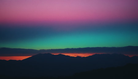 Beautiful sunset in the mountains. Colorful sky with clouds.の素材
