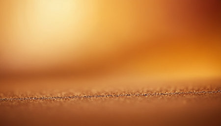 Golden glitter background. Abstract golden bokeh defocused lights.の素材