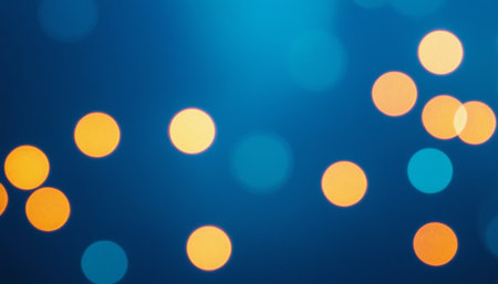 Abstract circular colorful bokeh from the party light on blue backgroundの素材