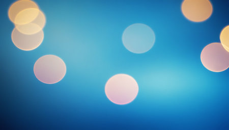 Abstract circular bokeh background, defocused lights on blue backgroundの素材