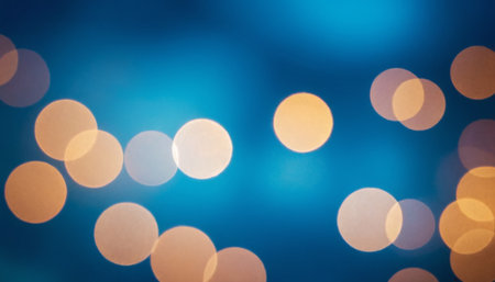 Abstract circular colorful bokeh from the party light on blue backgroundの素材