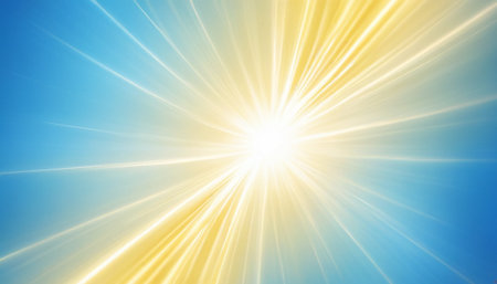 sunbeams on a blue and yellow background with lens flare effectの素材