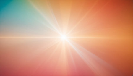 sunbeams and lens flare on the orange background. abstract backgroundの素材