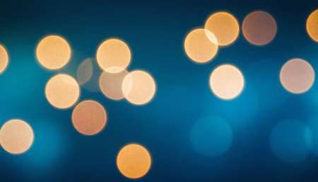 Abstract circular colorful bokeh from the party light on blue backgroundの素材