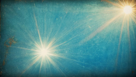 Blue grunge background with sun burst and space for text or imageの素材
