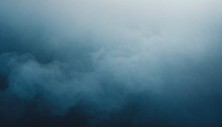 abstract background of blue and black fog or smoke on dark backgroundの素材