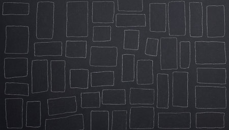 Blackboard texture background. Top view of blackboard with squares pattern.の素材