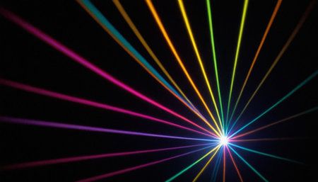 Colorful laser rays on a black background, close-up.の素材
