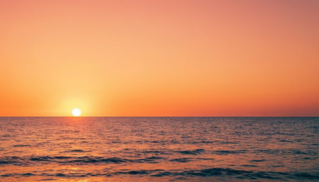 Sunset on the sea. The sun sets over the sea.の素材