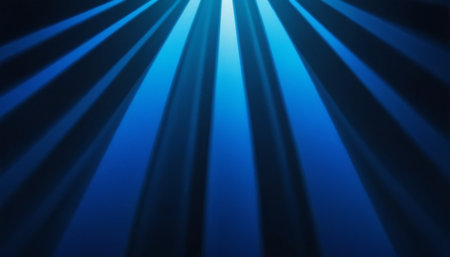 Blue rays of light on a dark blue background. Abstract background.の素材