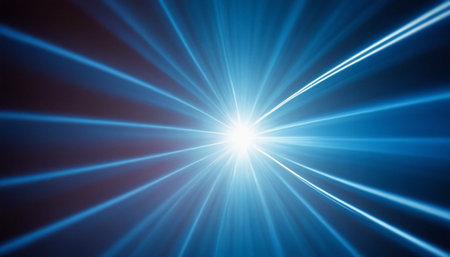 Abstract blue background with rays of light and lens flare. Texture.の素材