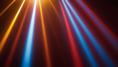 Colorful rays of light on a dark background. Abstract background.の素材
