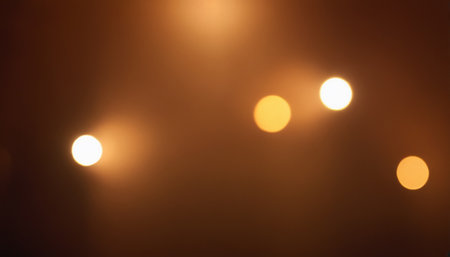 bokeh lights on dark background,abstract light background.の素材