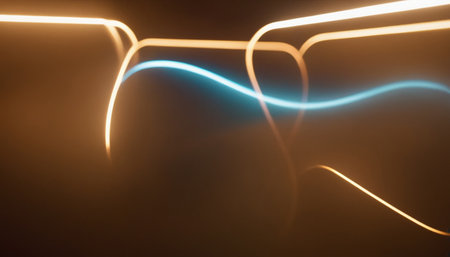 Neon light lines on a black background. Abstract light background.の素材