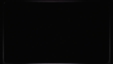 Blank black screen tablet pc computer isolated on black background with copy spaceの素材