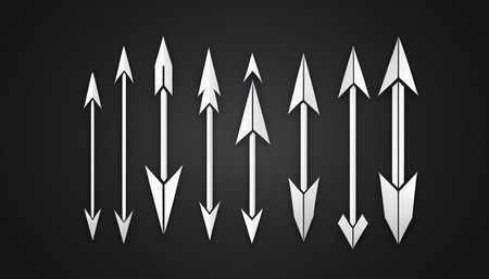 3d rendering of a group of white arrows on a black backgroundの素材