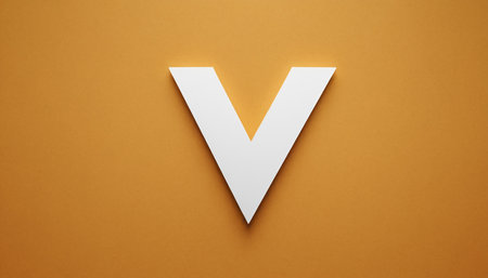 Letter V cut out of paper on orange background. 3d renderingの素材