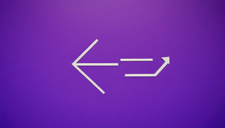 Arrow sign on a purple background. Minimalistic design.の素材