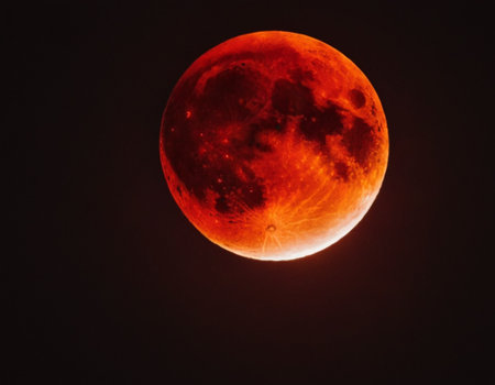 Bloody moon in the night sky, lunar eclipse, full moonの素材