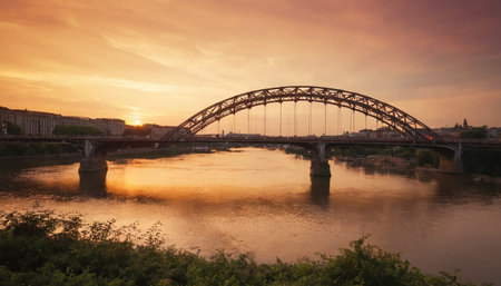 Bridge over the Danube river in Budapest, Hungary at sunset.の素材
