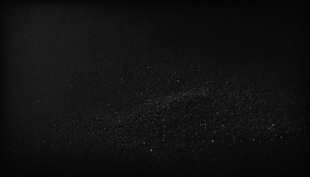 Black glitter texture abstract background. Dust particles on black background. Dust particles.の素材