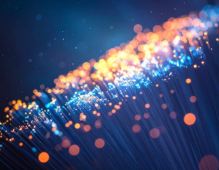 Fiber optical network cable close up with bokeh background.の素材