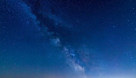 Milky way in the night sky with stars and space for your textの素材