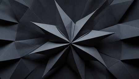 Black origami background. Abstract polygonal origami pattern.の素材