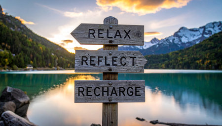 Wooden signpost in the middle of a lake with the text Relax, Relax, Reachingの素材