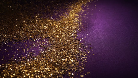 golden glitter texture on purple background. abstract background with copy spaceの素材