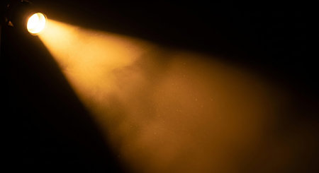 stage lighting effect with spotlights on a black background, close-upの素材