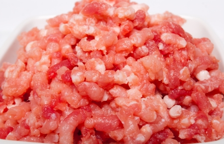 minced meat in porcelain bowlの写真素材