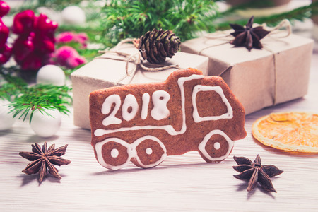 New Year decoration gingerbread truck with Year 2018の写真素材