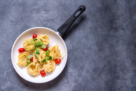 Pasta in white ceramic panの写真素材