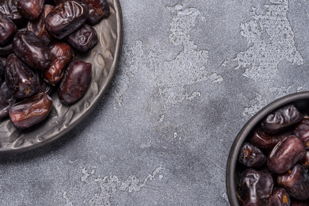 Black dates healthy dried fruitsの写真素材