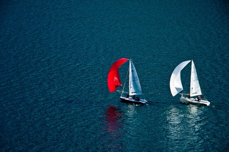 two boats sailing regatta on lake Lugano - Switzerlandのeditorial素材