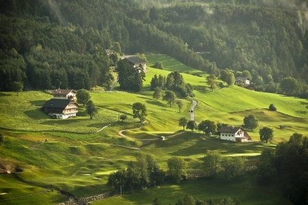 green hills lit by the sunの写真素材