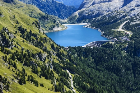 renewable energy, dam and mountain lake - Italyの写真素材