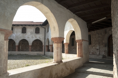 columns and arches in the old courtyardの写真素材