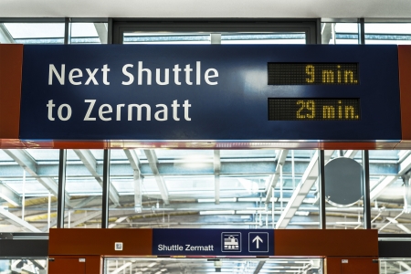 train station shuttle zermatt, signpost waiting timeのeditorial素材