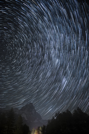 Star trails over the Mount Cervino in an autumn night, Aosta Valleyの写真素材