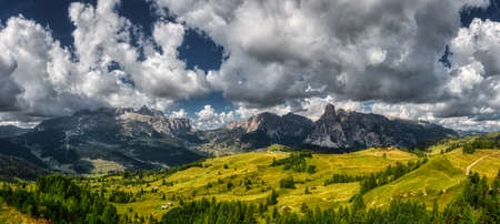 Landscape of Alta Badia valley seen from the highland PralongiÃ  with clouds in the skyの写真素材