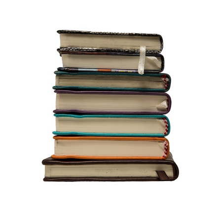 A set of old used notebooks isolated on white