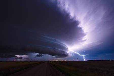 Supercell thunderstorm cloud with lightning bolt