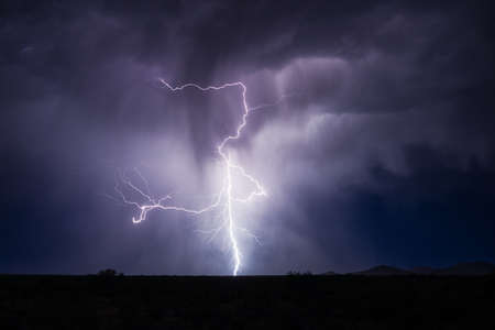 Lightning bolt strike in a thunderstormの写真素材