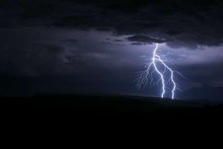 Lightning from a storm in Arches National Parkの写真素材