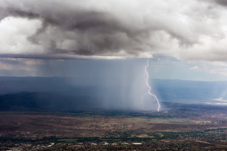 Thunderstorm with heavy rain and lightningの写真素材