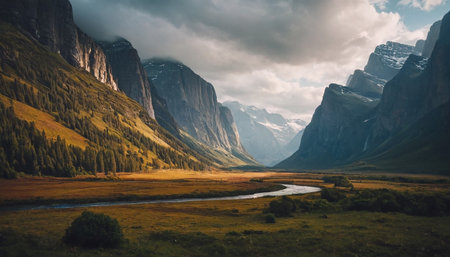 Beautiful mountain landscape with a river in the foreground and the mountains in the backgroundの素材