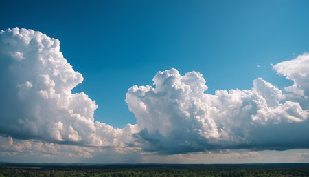 Clouds in the blue sky. Abstract nature background with copy space.の素材